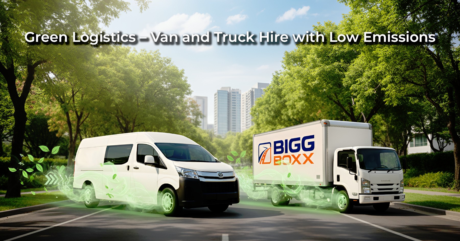 A white Bigg Boxx rental van and a white box truck driving on a sunlit city street lined with lush green trees, featuring green leaf graphics to represent low-emission green logistics | Green Logistics – Van and Truck Hire with Low Emissions | Bigg Boxx Rentals