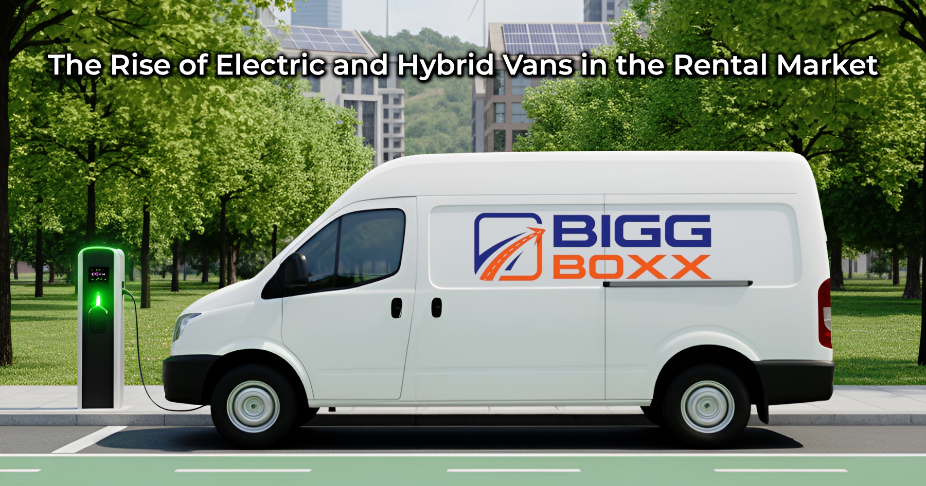 A white Bigg Boxx electric rental van with the company logo on its side is parked at a green-lit charging station on a city street. Lush trees line the road, and in the background, modern buildings with solar panels hint at a sustainable urban environment | The Rise of Electric and Hybrid Vans in the Rental Market | Bigg Boxx Rentals